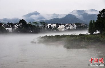 雨後至近村